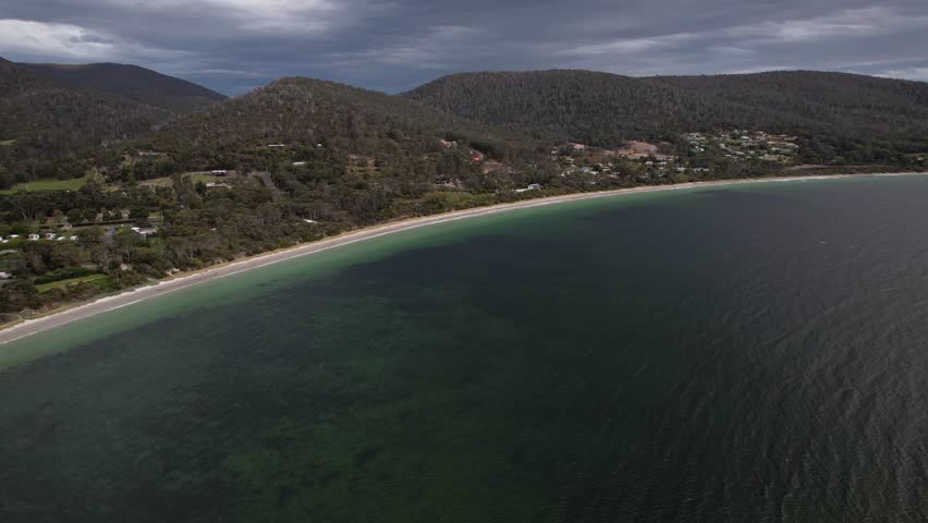 White Beach And Surrounding Mountains In Tasmania, Australia - Aerial Shot