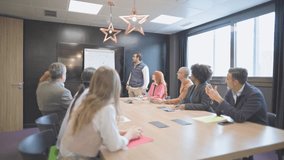 Diverse colleagues collaborating, discussing strategies, and sharing ideas during a productive office meeting - Powered by Shutterstock - Get 15% off with code: PIKWIZARD15