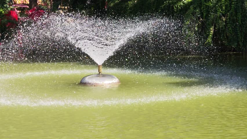 Fountain in the middle of a pond