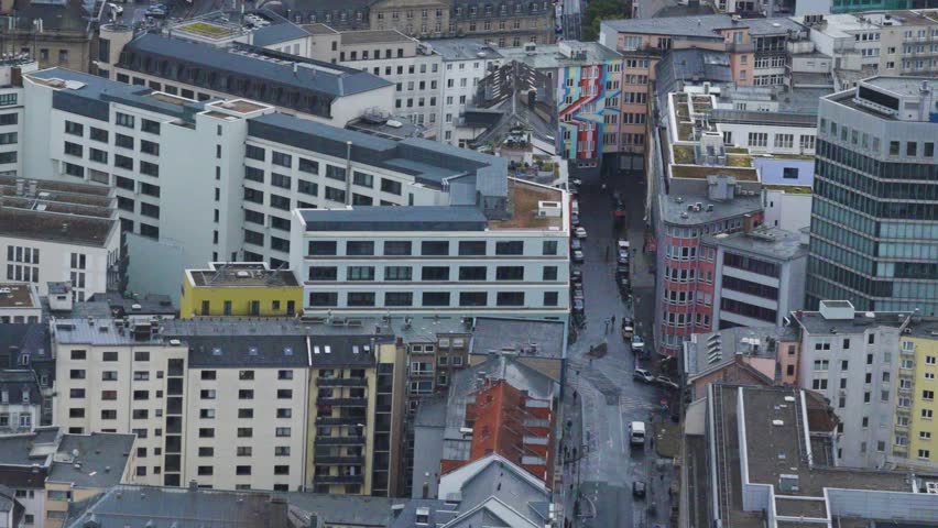 Aerial view of the Frankfurt skyline and city streets.