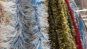 Colorful decorative Christmas tinsel. Gold and silver tinsel - Powered by Shutterstock - Get 15% off with code: PIKWIZARD15