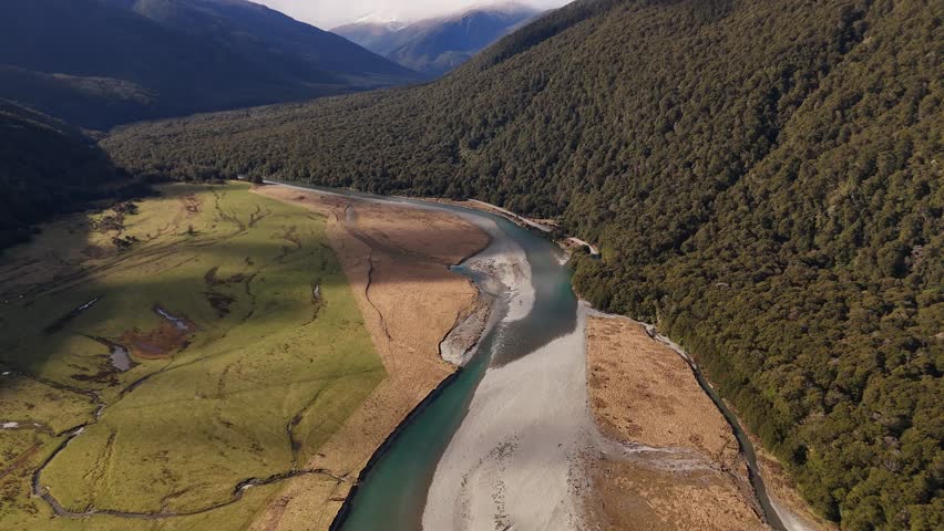 Drone flight over Mount Aspiring area with river on the South Island of New Zealand.