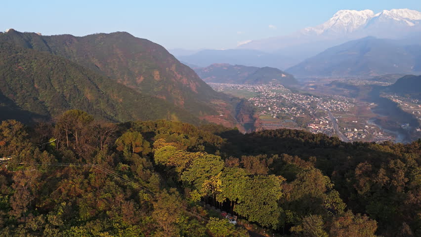 Aerial view rotating over Sarangkot, revealing the snowy peaks of Himalaya, Nepal