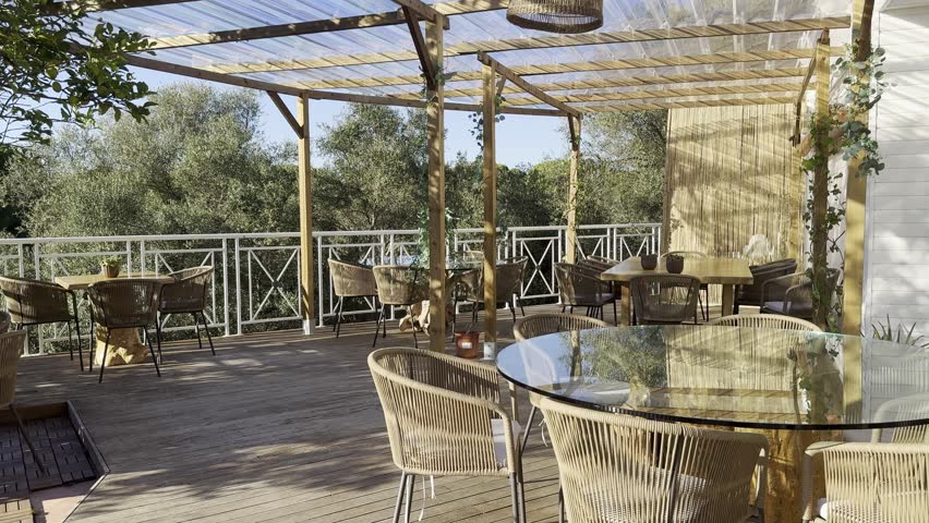 Stylish outdoor seating area connected to a modern living space with glass sliding doors.