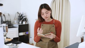 Young coffee shop owner feeling stressed while working on early business results, inexperienced entrepreneurs facing financial difficulty, lack learning, emotional pressure in small business startup - Powered by Shutterstock - Get 15% off with code: PIKWIZARD15