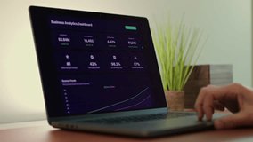 Business professional analyzing colorful sales funnel, ROI, inventory dashboards on laptop - Perfect for SaaS, analytics, fintech, data themes - Powered by Shutterstock - Get 15% off with code: PIKWIZARD15