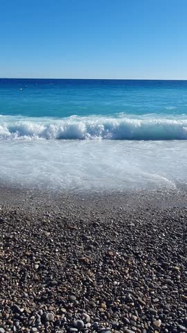 The colours of the sea on the beach in Nice, France