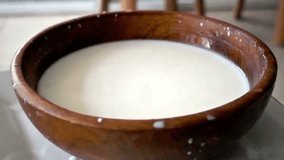 Strawberries falling into bowl of yogurt in slow motion for healthy lifestyle - Powered by Shutterstock - Get 15% off with code: PIKWIZARD15