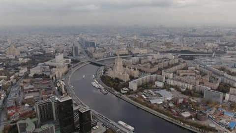 Rising Forward Drone Shot over Sweeping Riverfront