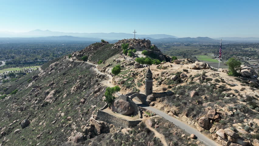 Riverside, California – Aerial Shot of Mount Rubidoux with Hikers, Cross, and Tower Bridge in the Summer in Downtown Riverside, CA Overviewing the Mountains