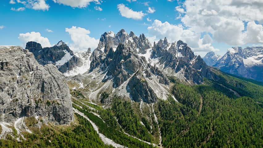 Aerial shot of dramatic rock rugged Dolomites mountain landscape. Landscape of South Tyrol, Northern Italy