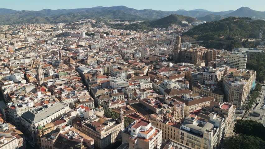 Captivating drone video shows a scenic view of historic center of Malaga, a coastal city nestled in Andalusia province, southern SPain.