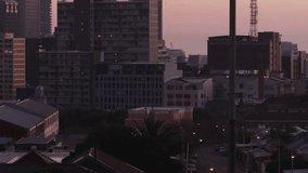 Lens flare appearing, dusk skyline showing blue data graphics rising, scrolling and visualizing. Urban, cityscape, twilight, neon, overlays, futuristic, animation - Powered by Shutterstock - Get 15% off with code: PIKWIZARD15