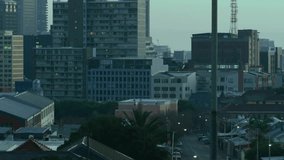 Blue streaks starting at left edge sweeping across skyline, overlaying buildings, showing data flow. Cityscape, harbor, urban, modern, grid, digital, futuristic - Powered by Shutterstock - Get 15% off with code: PIKWIZARD15