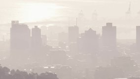 On data update two translucent circular charts growing and shifting over skyline to show city data. Infographic, visualization, globe, urban, horizon, metrics, growth - Powered by Shutterstock - Get 15% off with code: PIKWIZARD15