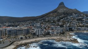 UI starting overlays, highlighting buildings and peak while drone drifting onward for mapping. Aerial, coastal, suburb, conical, mountain, midrise, residential - Powered by Shutterstock - Get 15% off with code: PIKWIZARD15