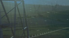 Steel tower with green graph moving right, dipping, peaking, falling on sensor update, showing load. Pylon, transmission, rural, landscape, gridlines, overlay, telemetry - Powered by Shutterstock - Get 15% off with code: PIKWIZARD15
