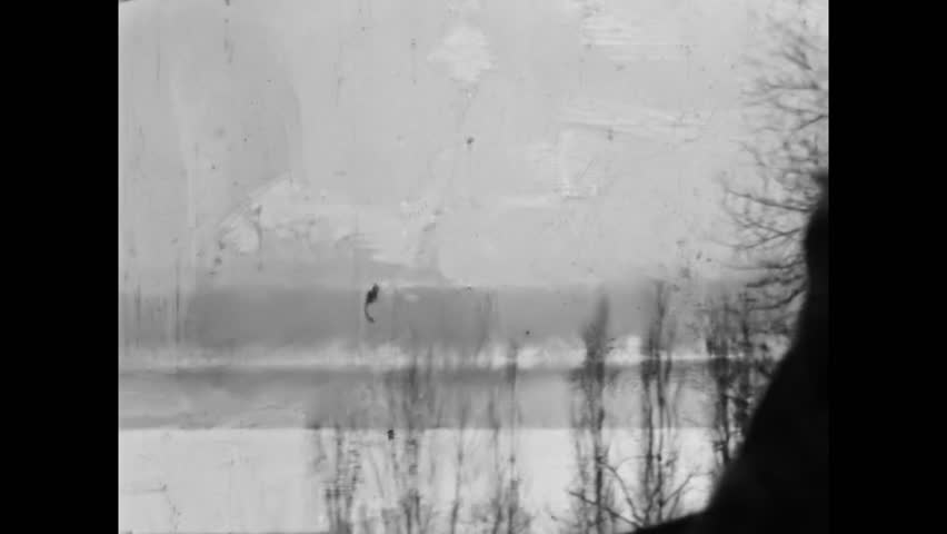 Wide top view, snowy winter landscape. Monochrome frosty nature panorama on black and white film. Abstract cold frosty ice lake. Calm seasonal vintage travel. Old archive video. Archival retro 1960s
