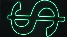 Neon glowing green dollar symbol on dark background financial digital money concept neon - Powered by Shutterstock - Get 15% off with code: PIKWIZARD15