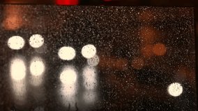 glass panels with rain drops reflections evening city lights and cinematic mood - Powered by Shutterstock - Get 15% off with code: PIKWIZARD15