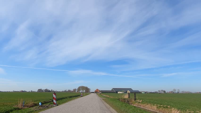 Cycling through Friesland on a sunny autumn winter day