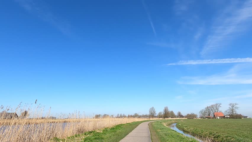 Cycling through Friesland on a sunny autumn winter day