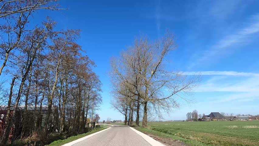 Cycling through Friesland on a sunny autumn winter day