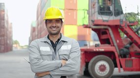 In a bustling container warehouse, engineer worker engages in quality control checks and communicates with colleagues via phone and radio, then looking at camera and smiling confidently. - Powered by Shutterstock - Get 15% off with code: PIKWIZARD15