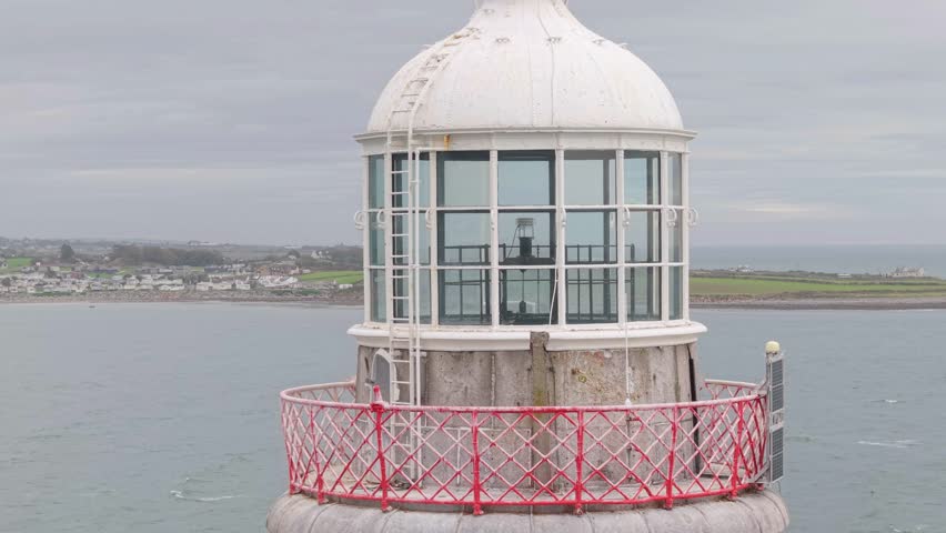 Weathered Masonry and Safety Railing of a Maritime Beacon Haulbowline Lighthouse.