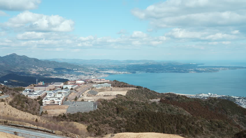 Winter Landscape Overlooking a Coastal City and the Sea