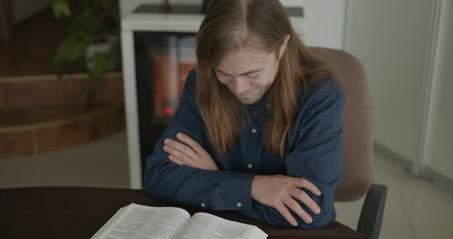 Male Christian Morning Prayer and Reading the Bible. 4K 10-bit