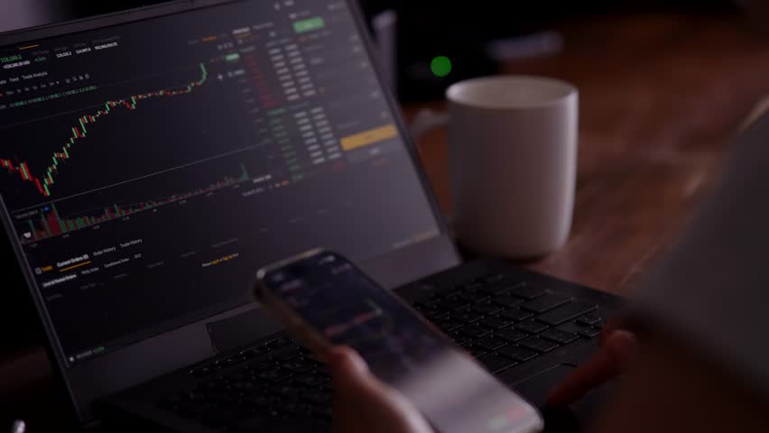 Trading Cryptocurrency And Stocks. Investor Analyzing Financial Market Charts And Data Graphics. Digital Finance And Online. Crypto Exchange Wealth Management. Global Market Analysis Online Brokerage