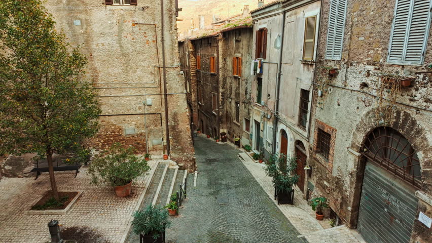 Wandering through cobblestones and stone buildings in the old town of Tivoli, Lazio, Rome, Italy
