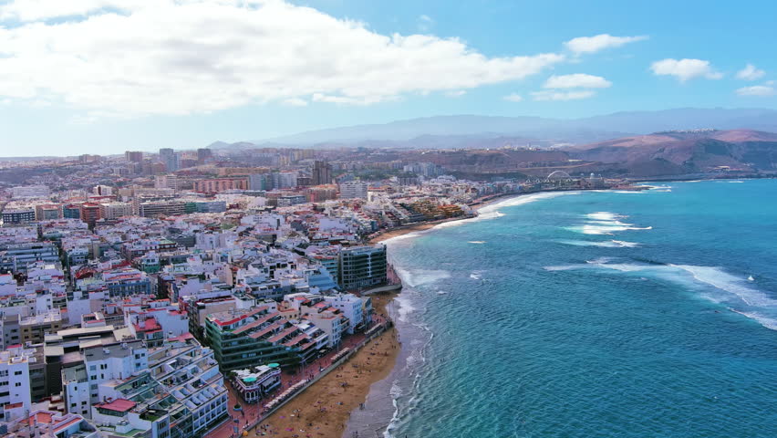 Las Palmas de Gran Canaria, Canary Islands, Spain: Aerial view of one of capital cities of Canary Islands, famous beach Playa de Las Canteras - landscape panorama of  Atlantic Ocean islands from above