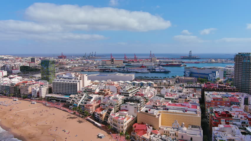 Las Palmas de Gran Canaria, Canary Islands, Spain: Aerial view of one of capital cities of Canary Islands, famous beach Playa de Las Canteras - landscape panorama of  Atlantic Ocean islands from above