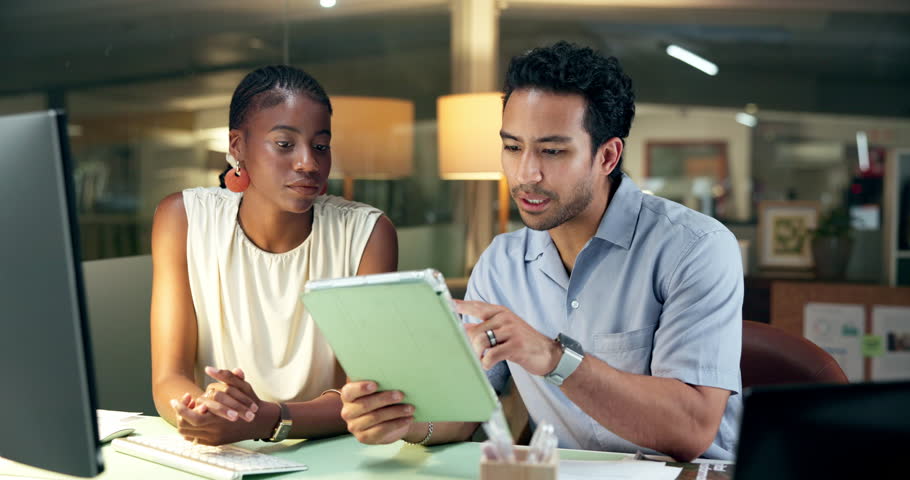 Team, computer and tablet with business people in office for research, media campaign and night. Branding advisor, deadline and planning with employees and tech in agency for online feedback