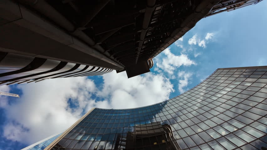 Bottom-up wide angle shot of important and futuristic skyscrapers in the financial center of London, England, UK
