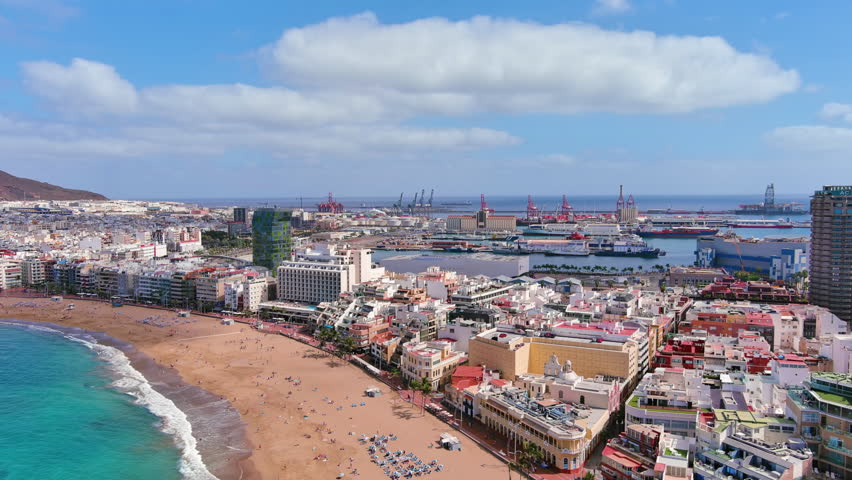 Las Palmas de Gran Canaria, Canary Islands, Spain: Aerial view of one of capital cities of Canary Islands, famous beach Playa de Las Canteras - landscape panorama of  Atlantic Ocean islands from above
