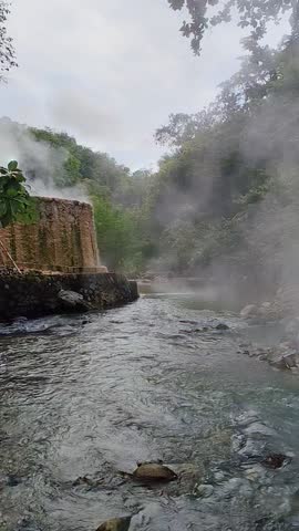 a natural geyser in Cisolok with river steam. One geyser over the world. Sukabumi, Indonesia. 10 May 2025
