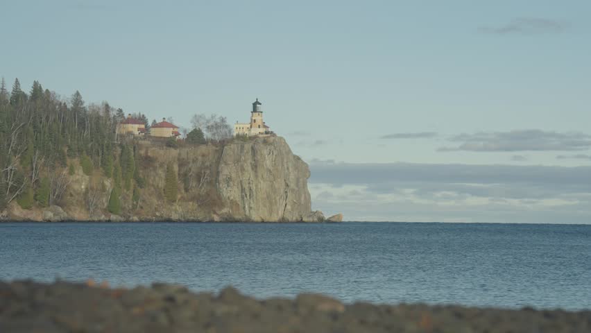 Low Angle View of Split Rock Lighthouse atop Cliff from Pebble Beach
