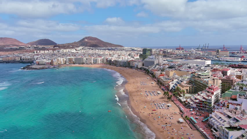 Las Palmas de Gran Canaria, Canary Islands, Spain: Aerial view of one of capital cities of Canary Islands, famous beach Playa de Las Canteras - landscape panorama of  Atlantic Ocean islands from above