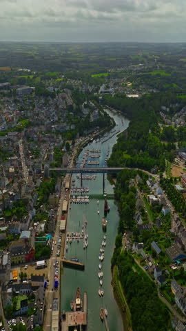  A beautiful city on the Atlantic Ocean on the west coast of France. Aerial view on the harbor of Douarnenez in Brittany. A quiet fishing bay with yachts and boats