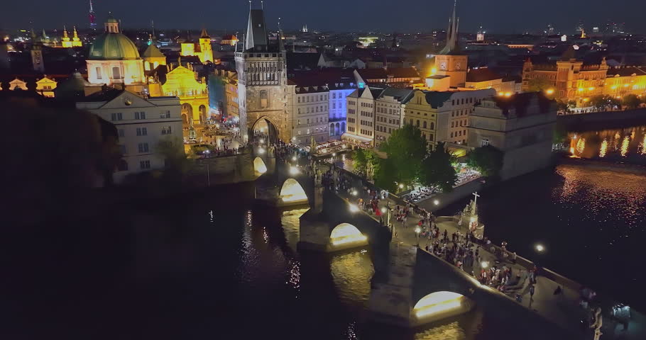 Aerial view of Prague at night. The most beautiful view of the Charles Bridge at night and beautifully illuminated by lights. Czech Republic