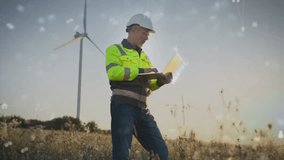 Caucasian male engineer holding laptop and monitoring turbine performance in open field at sunset. Standing near rotating blades while hologram interface elements illuminating renewable energy data. - Powered by Shutterstock - Get 15% off with code: PIKWIZARD15