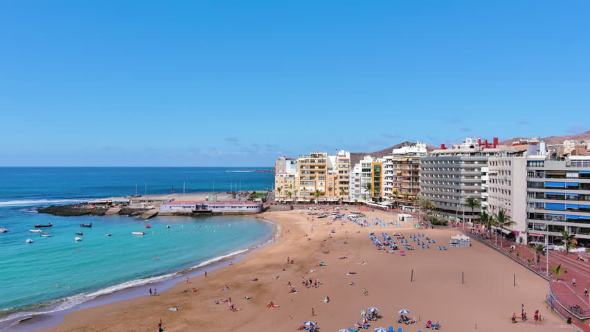 Las Palmas de Gran Canaria, Canary Islands, Spain: Aerial view of one of capital cities of Canary Islands, famous beach Playa de Las Canteras - landscape panorama of  Atlantic Ocean islands from above
