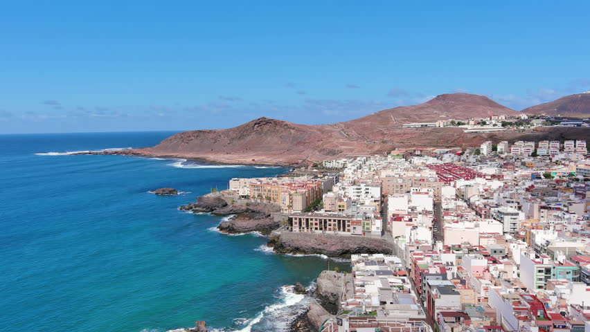 Las Palmas de Gran Canaria, Canary Islands, Spain: Aerial view of one of capital cities of Canary Islands, famous beach Playa de Las Canteras - landscape panorama of  Atlantic Ocean islands from above