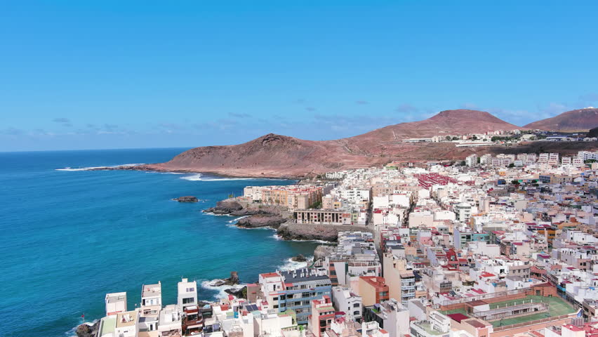 Las Palmas de Gran Canaria, Canary Islands, Spain: Aerial view of one of capital cities of Canary Islands, famous beach Playa de Las Canteras - landscape panorama of  Atlantic Ocean islands from above