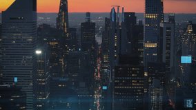 Aerial view of a modern cityscape at dusk, featuring an intricate overlay of digital data lines, connected nodes, and cloud icons representing advanced smart city technology and global network connectivity - Powered by Shutterstock - Get 15% off with code: PIKWIZARD15