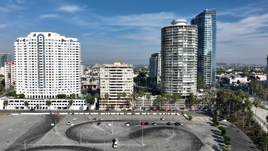 Long Beach, California, USA - Aerial View of Alamitos Beach on Ocean Blvd Going Left to Right Apartment Building and Condos in Shoreline Long Beach, CA