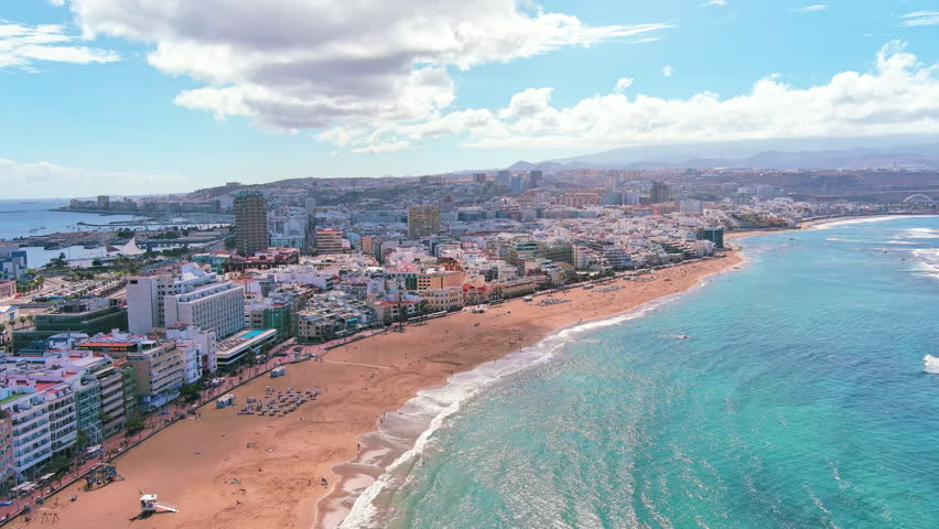Las Palmas de Gran Canaria, Canary Islands, Spain: Aerial view of one of capital cities of Canary Islands, famous beach Playa de Las Canteras - landscape panorama of  Atlantic Ocean islands from above
